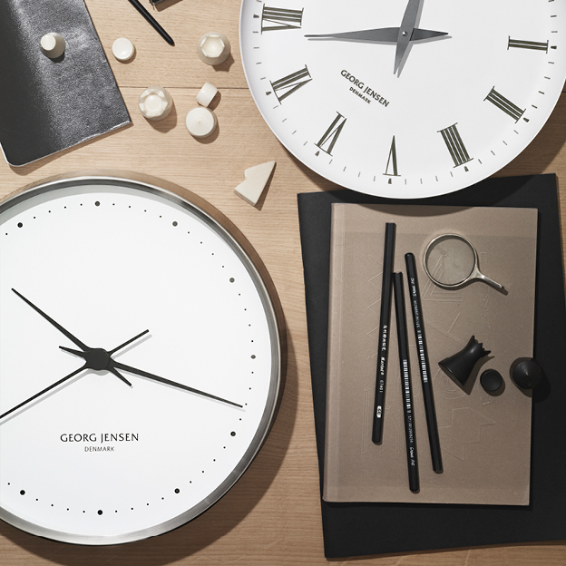 Stainless steel wall clocks from the Koppel collection designed by Henning Koppel