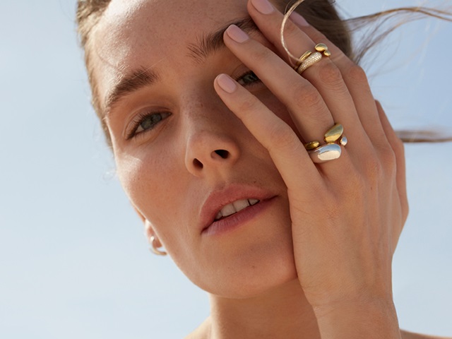 Georg Jensen Mercy collection 18 kt yellow gold with white diamonds and sterling silver ring combination of large and small