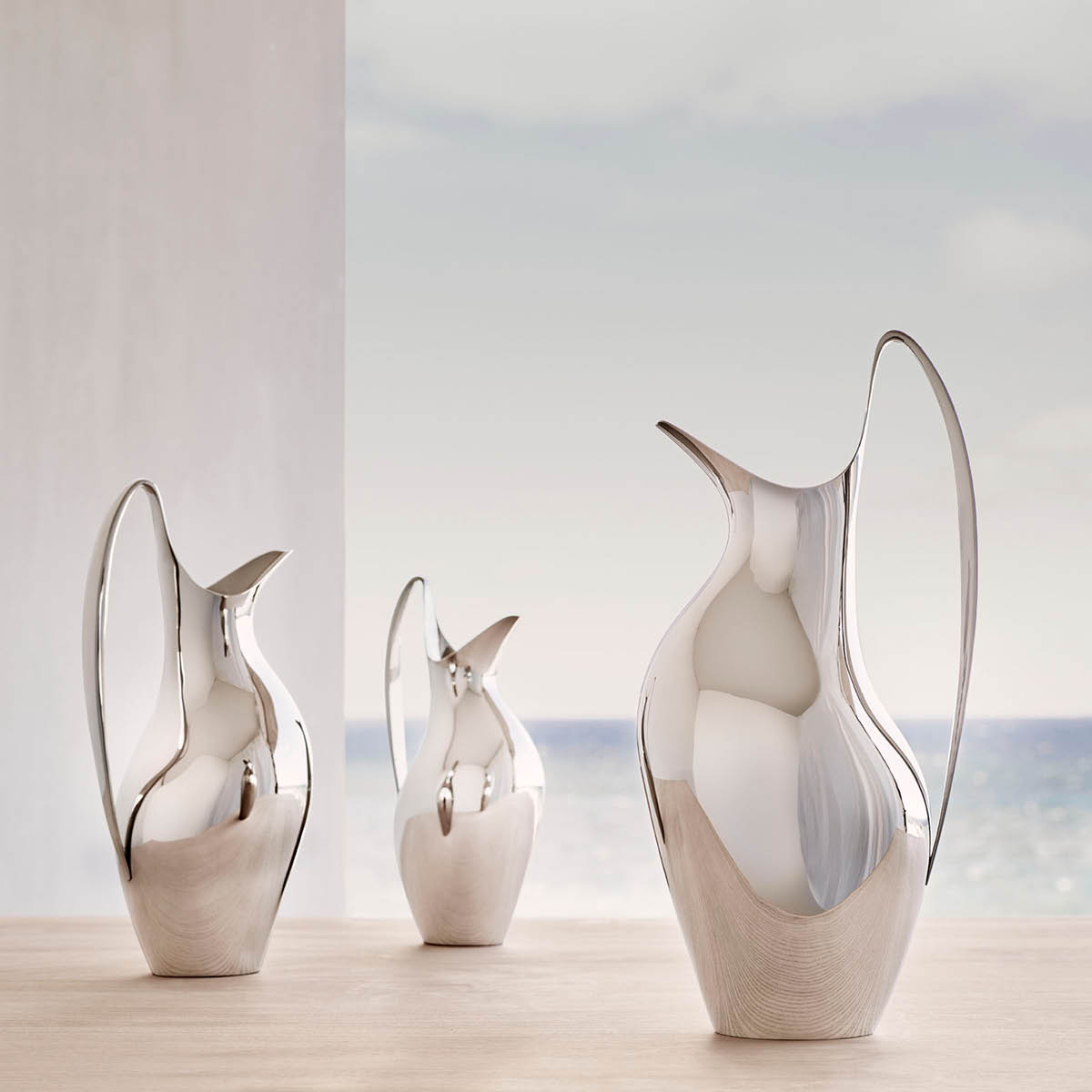 HK pitchers in mirror-polished stainless steel 
