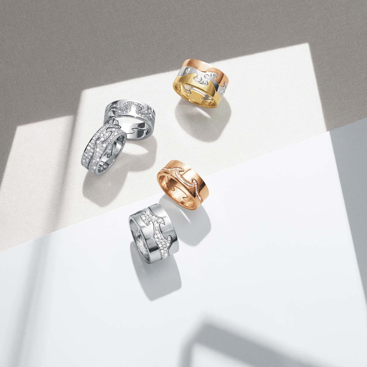 Fusion 3-piece rings in white, yellow and rose gold with brilliant cut diamonds and Fusion 2-piece rings in white and rose gold with brilliant cut diamonds 