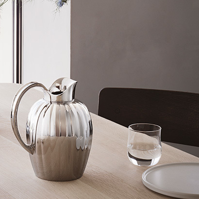 Water pitcher from the Bernadotte collection in Polished Stainless Steel designed by Henning Koppel