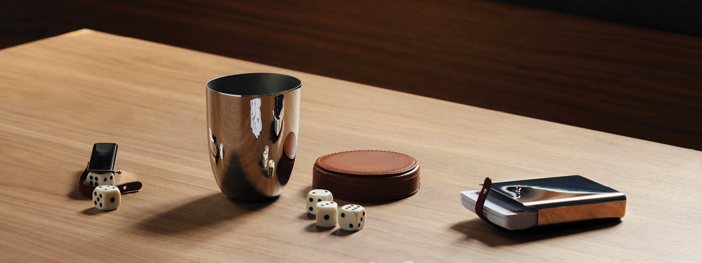 Dices, cardholder and game items from the Sky collection designed by Georg Jensen
