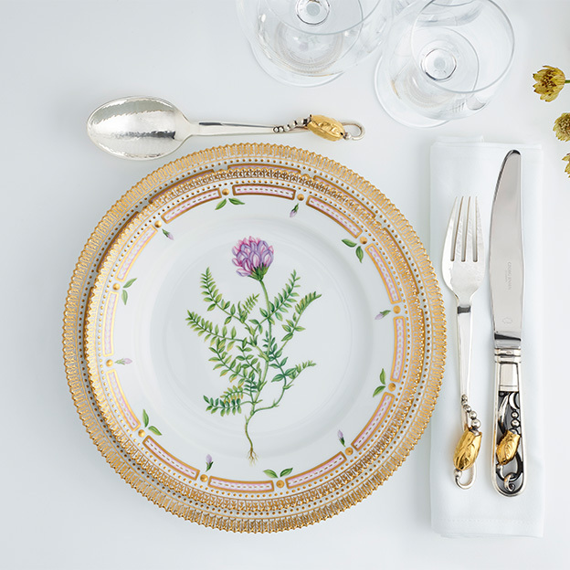 Fine sterling silver and 18 kt. gold cutlery knife, fork and dessert spoon from the Magnolia collection by Georg Jensen