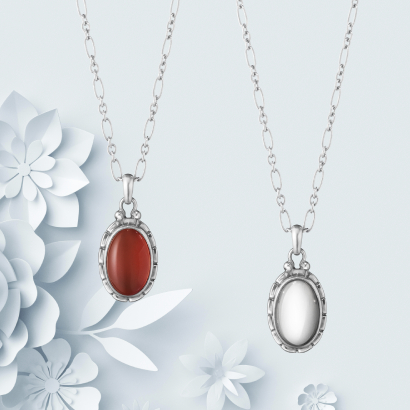 Necklace with pendant in oxidized sterling silver and silver stone and pendant with red carnelian stone from the Heritage collection inspired by Georg Jensen