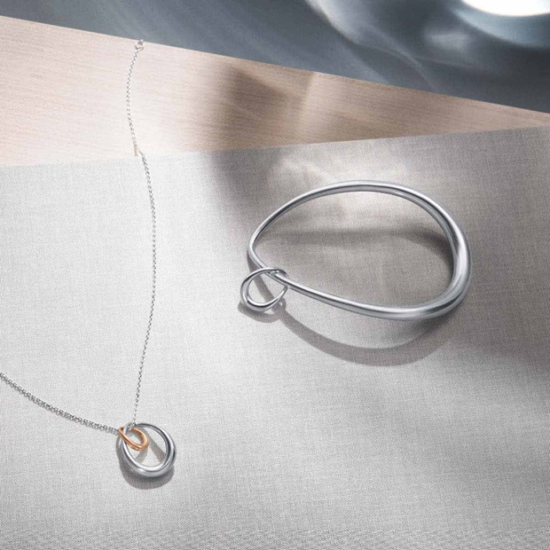 Offspring bangle in sterling silver and Offspring necklace in sterling silver with rose gold 