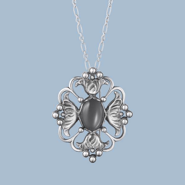 Oxidized sterling silver with black stone from the Moonlight Blossom collection made by Georg Jensen