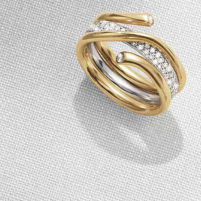 Magic ring combination in 18 kt. gold and with diamonds