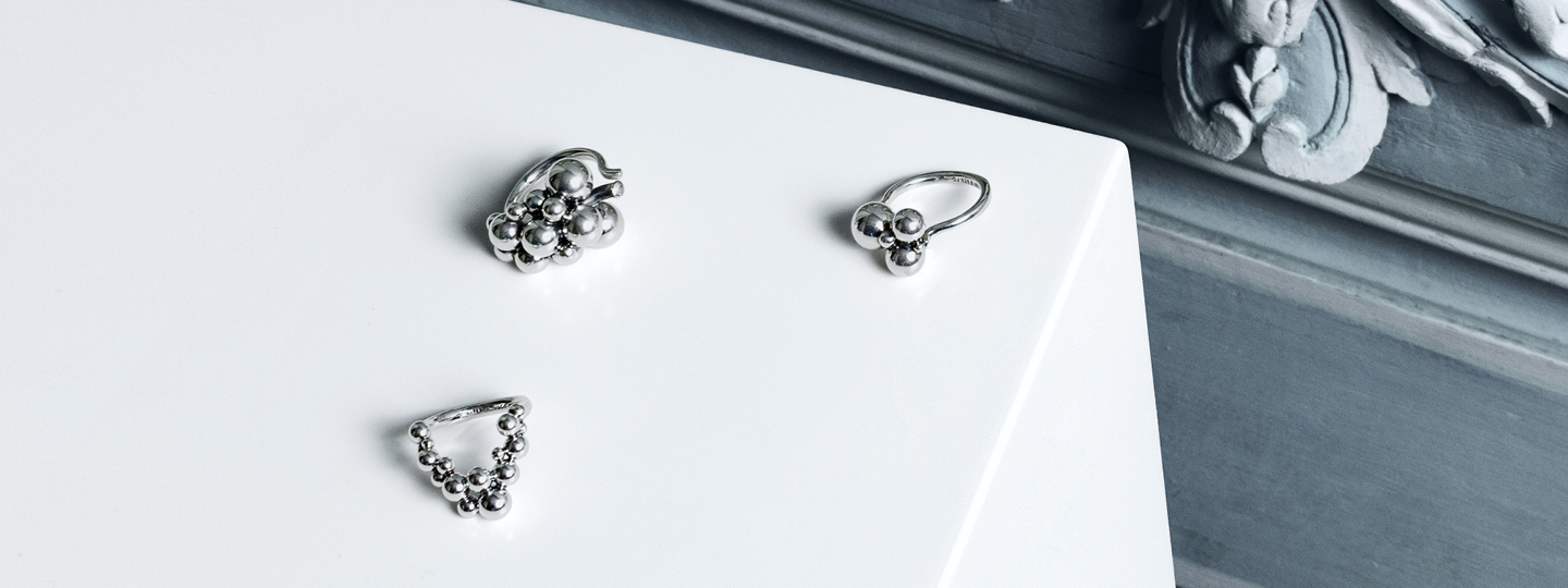 Sterling silver rings from Moonlight Grapes collection designed by Georg Jensen