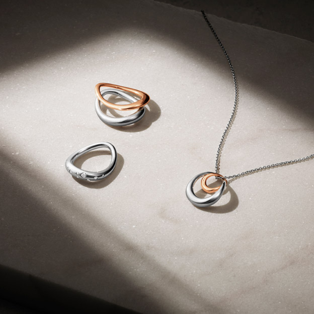 Sterling silver and rose gold rings and pendant with diamonds  from the Offspring collection designed by Jacqueline Rabun