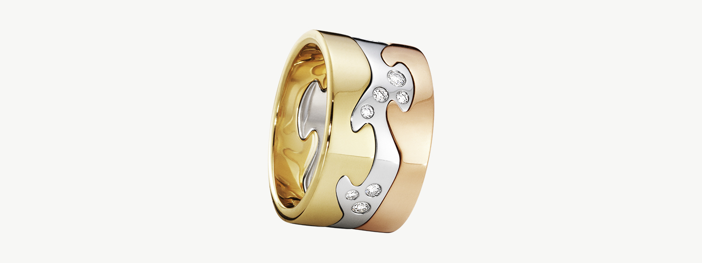 Fusion ring combination in 18kt. gold, sterling silver with diamonds and rosegold designed by Nina Koppel