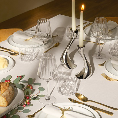 Holiday table setting featuring Copenhagen, Bernadotte and Cobra collections by Georg Jensen.