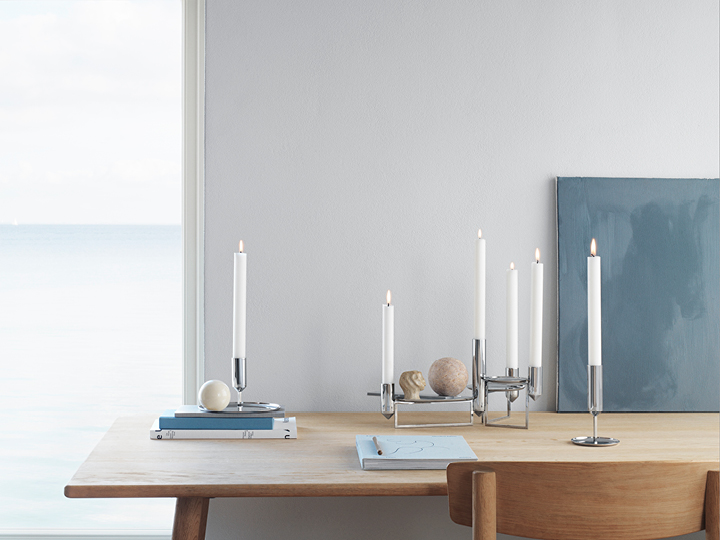 tunes centrepiece and candleholders in stainless steel 