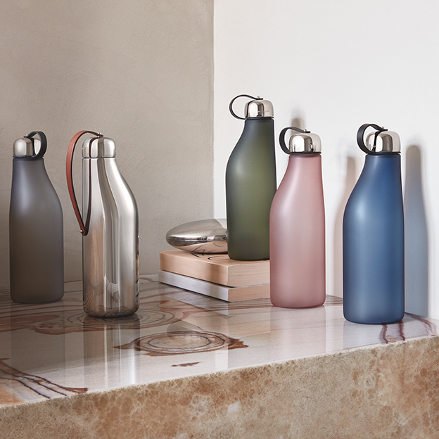plastic colourful bottles and stainless steel water bottle from the Sky collection designed by Aurelian Barbry for Georg Jensen