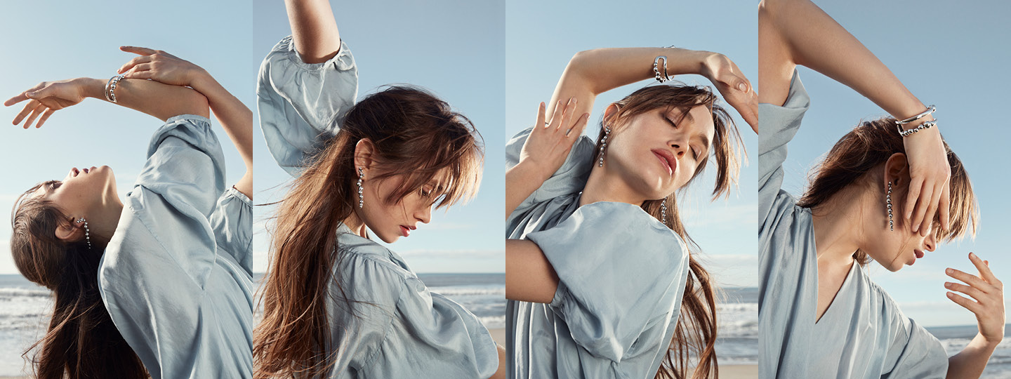 Girl in sterling silver jewellery from the Moonlight Grapes collection designed by Georg Jensen